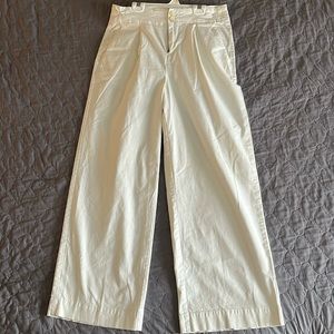 High wasted, 98% cotton and 2% spandex, wide pant leg, no belt loops